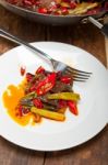 Fried Chili Pepper And Vegetable On A Wok Pan Stock Photo