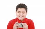 Small Boy With Digital Camera Stock Photo