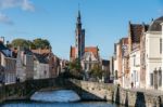 View Down A Canal In Bruges West Flanders In Belgium Stock Photo