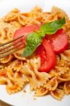 Italian Pasta Farfalle Butterfly Bow-tie And Tomato Sauce Stock Photo