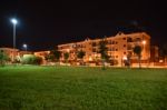 Night Public Park In The City With Houses Near Stock Photo