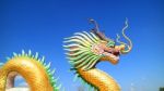 Dragon Statue Under Blue Dragon Sky Stock Photo