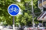 Blue Bike Sign, Bike Lane Symbol In Downtown City Stock Photo