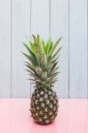 Pineapple On A Blue Pastel Background Stock Photo