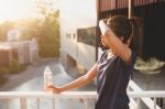 Sports Women Relax Time And Drinking Water Stock Photo