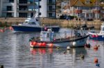 Boats In The Harbour At Lyme Regis Stock Photo