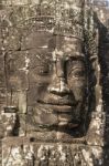 Ancient Stone Faces Of King Jayavarman Vii At The Bayon Temple, Stock Photo