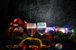 Two Glasses Of Champagne With A Christmas Decor In The Background Stock Photo