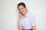 Portrait Of Thai High School Student Uniform Teen Beautiful Girl Calling Smart Phone, Stock Photo