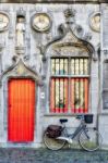 Bicycle Outside A Property In Market Square Bruges West Flanders Stock Photo