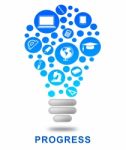 Progress Lightbulb Indicates Growth Advancement And Betterment Stock Photo