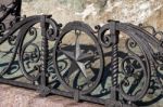 Metal Artwork Around The Statue Of Mario Cermenati In Lecco Stock Photo