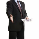 Some Unrecognizable Businessman In Dark Suit Shows A Spread Of 2 Stock Photo