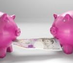 Piggybanks Eating Money Shows Shared Savings Stock Photo