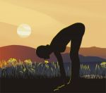 Yoga At Sunrise Stock Photo