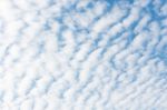 White Clouds On Blue Sky Background Stock Photo