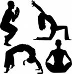 Male And Female Doing Yoga Stock Photo