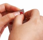 Removing A Pill From Packet Stock Photo