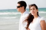 Young Couple On The Beach Stock Photo