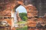 Old Ancient Pagoda In Lopburi Thailand, With Old Exterior Brick Wall Background Vintage Style Grung Texture Stock Photo