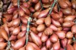 Onions For Sale On A Market Stall In Bergamo Stock Photo