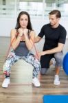 Workout With Couch At Fitness Club Stock Photo