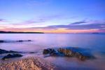 Twilight Mist Sea With Rocks In Samila Beach, Songkhla Stock Photo