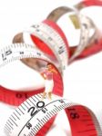 Miniature Woman Standing Near Measuring Tape, Thinking Of Weight Stock Photo