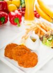 Classic Milanese Veal Cutlets And Vegetables Stock Photo