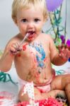 Baby Girl Celebrating Her First Bithday With Gourmet Cake And Ba Stock Photo