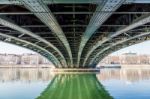 Under A Bridge With A River Stock Photo