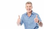 Handsome Man Gesturing Double Thumbs Up Stock Photo