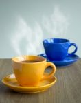 Steaming Coffee Cup On Table Stock Photo