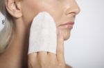 Young Woman Clean Face With Wet Wipes Stock Photo