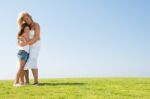 Affectionate Mother Embracing Stock Photo