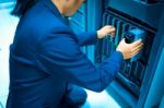 Man Fix Server Network In Data Center Room Stock Photo