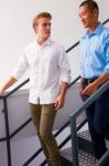 Two Young Men Standing Staircase Stock Photo