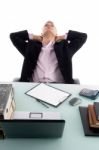 Tired Businessman Looking Upward Stock Photo