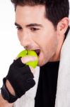 Fitness Man Having Green Apple Stock Photo