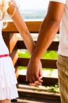 Couple Holding Hands Stock Photo