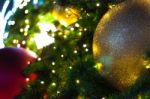 Close Up Big Yellow Glitter Ball Christmas On Tree With Wire White Light Background Stock Photo