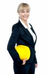 Pretty Business Architect With Yellow Safety Helmet In Hand Stock Photo