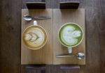 Coffee Late And Green Tea Late On Wooden Tray Stock Photo