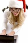 Santa Hat Woman Using Laptop Stock Photo