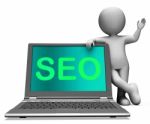 Seo Laptop And Character Shows Search Engine Optimization Stock Photo