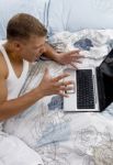 Male Working On Laptop Stock Photo