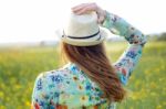 Beautiful Young Woman Enjoying Summer In A Field Stock Photo