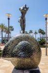 Nude Woman Walking Up Stairs Statue By Salvador Dali In Marbella Stock Photo