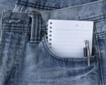 Blue Jeans And Notepad Stock Photo