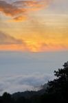 Colorful Sunrise Above The Clouds Stock Photo